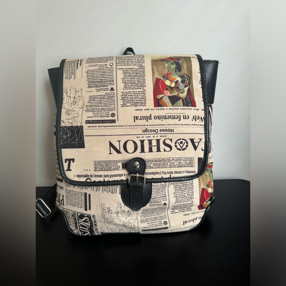 Newsprint Faux Leather Backpack